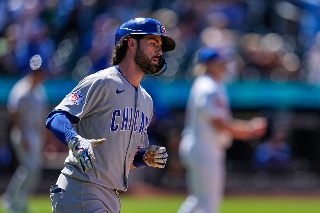 Chicago Cubs' Dansby Swanson runs the bases after hitting a grand slam during the eighth inning of a baseball game against the New York Mets Wednesday, June 24, 2026, in New York. (AP Photo/Frank Franklin II)
