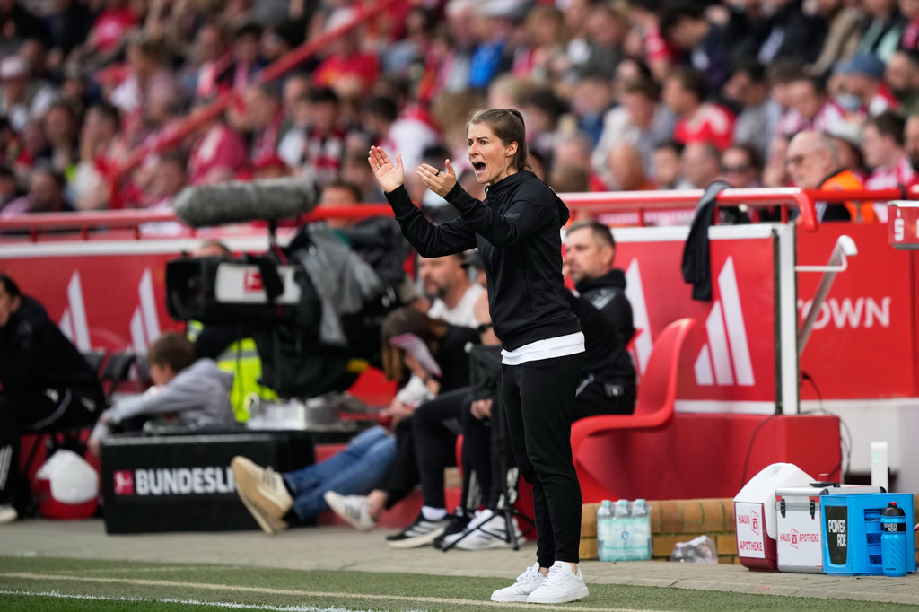 New head coach of German Bundesliga soccer club 1. FC Union Berlin Marie-Louise Eta reacts during the German Bundesliga soccer match between FC Union Berlin and Wolfsburg in Berlin, Germany, Saturday, April 18, 2026. (AP Photo/Ebrahim Noroozi)