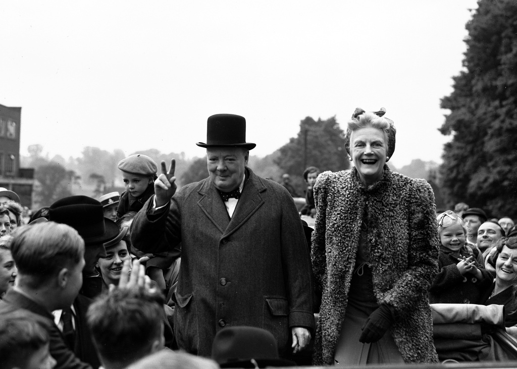FILE - Britain's Prime Minister Winston Churchill and his wife Clementine tour Churchill's constituency of Woodford, in Essex, England, as part of the Conservative's General Election campaign, May 26, 1945. (AP Photo/Eddie Worth, File)