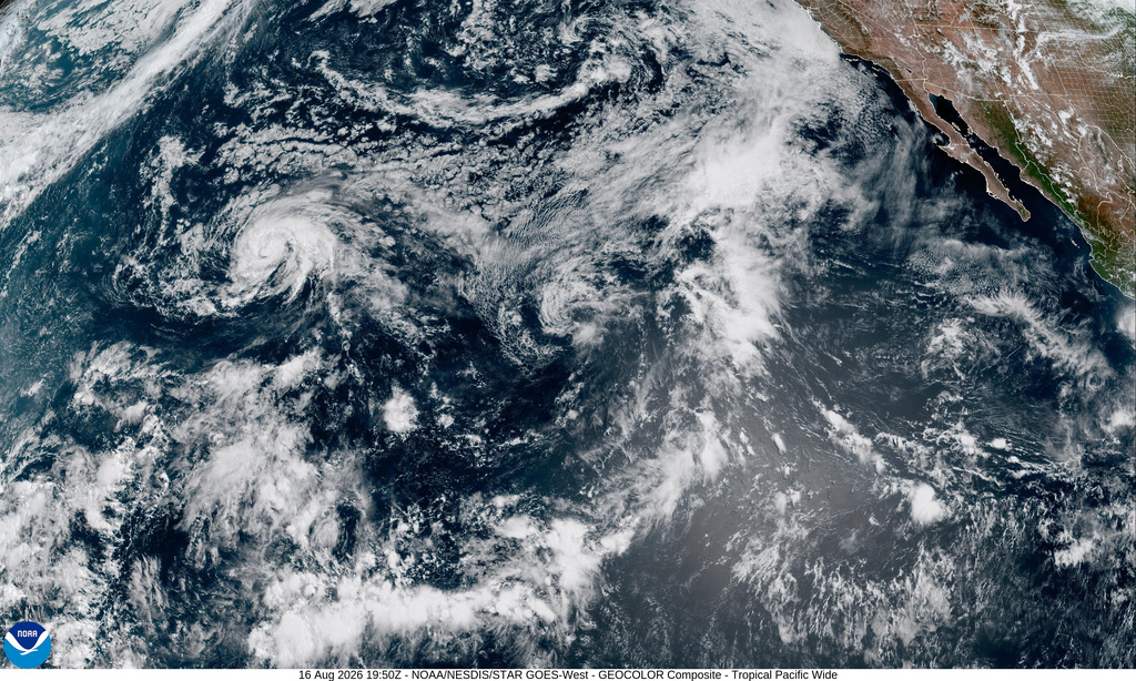 This NOAA satellite image taken at 3:50 PM ET (EDT) on Sunday, Aug. 16, 2026, shows Tropical Storm Lala over Hawaii. (NOAA via AP)
