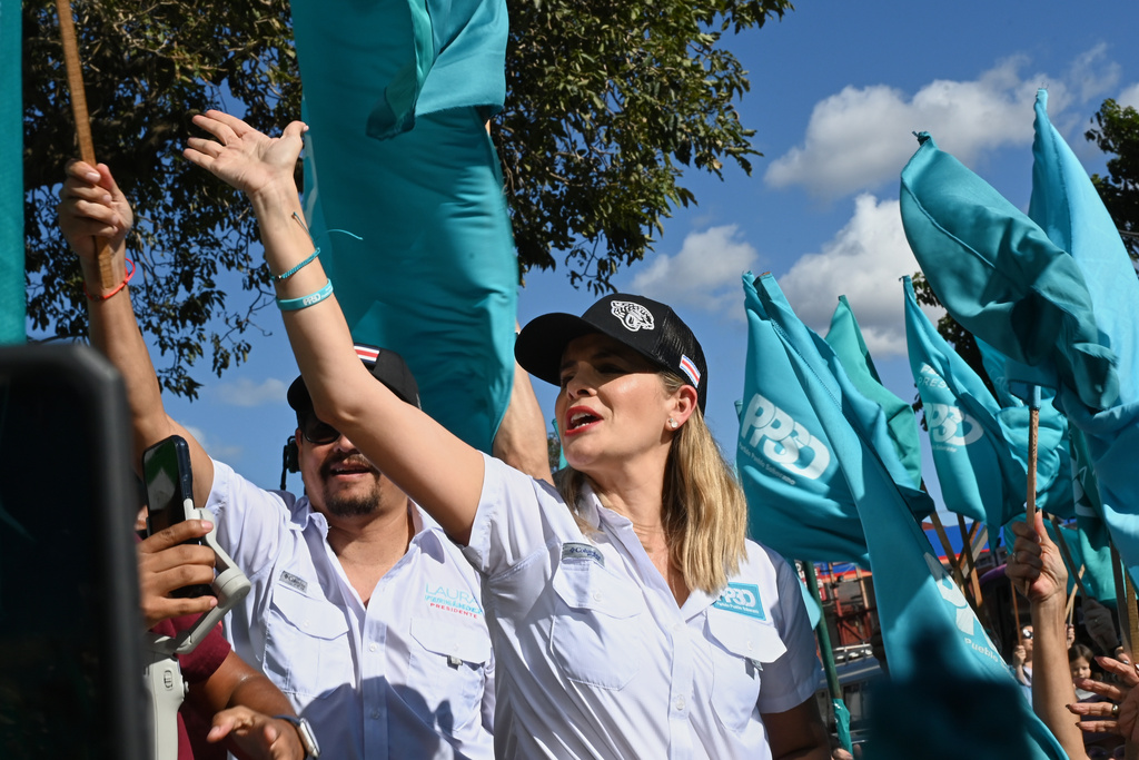 Costa Rican presidential candidate Laura Fernandez greets supporters during a campaign rally in San Jose, Costa Rica, Saturday, Jan. 24, 2026. (AP Photo/Carlos Gonzalez)