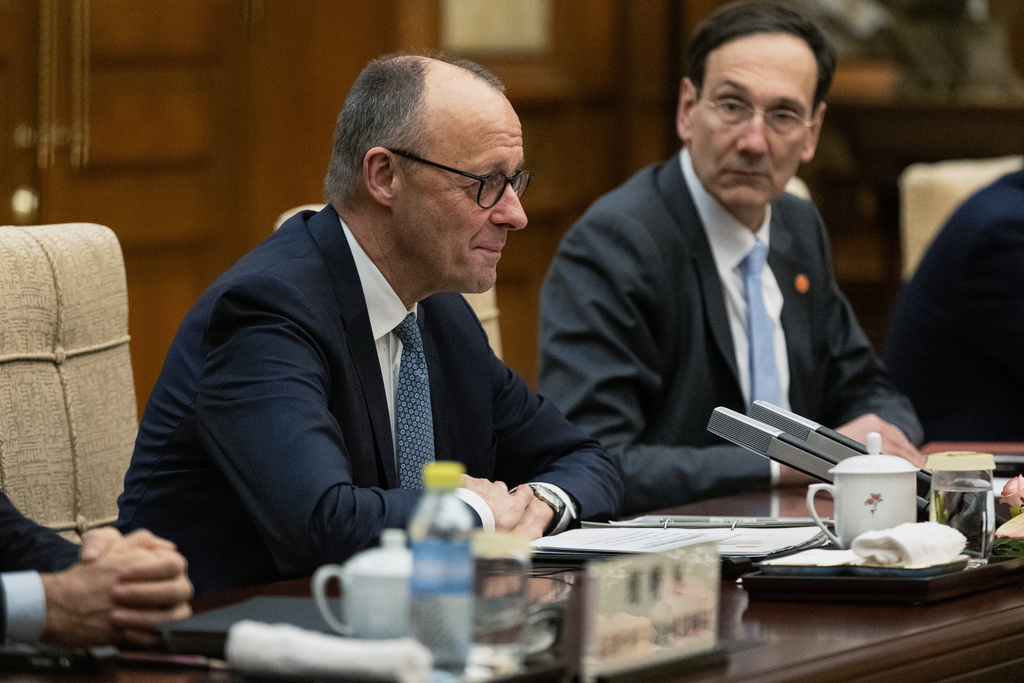 German Chancellor Friedrich Merz participates in a meeting with Chinese President Xi Jinping at the Diaoyutai State Guesthouse in Beijing, China, Wednesday, Feb. 25, 2026. (Jessica Lee/Pool Photo via AP)
