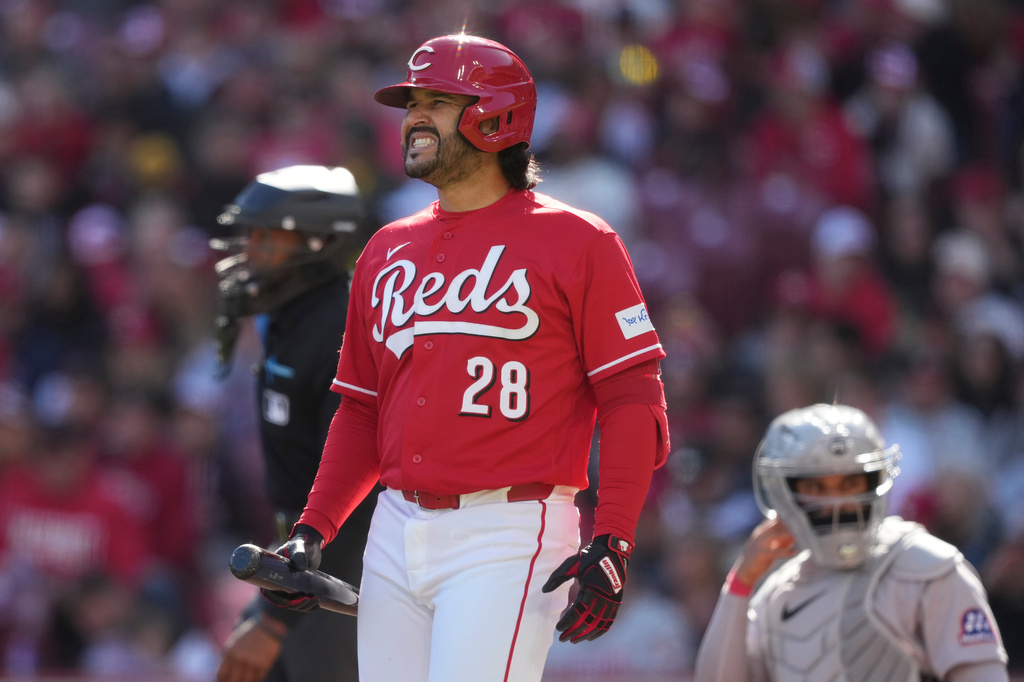 Cincinnati Reds' Eugenio Suárez reacts during an at-bat in the first inning of a baseball game between the Cincinnati Reds and the Boston Red Sox in Cincinnati, Saturday, March 28, 2026. (AP Photo/Carolyn Kaster)