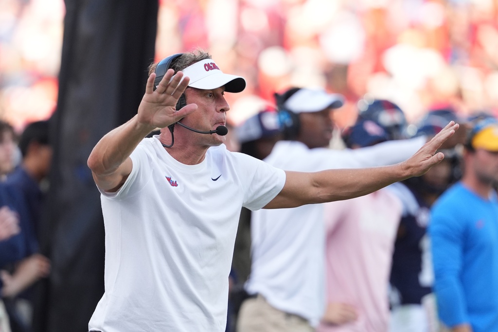 Mississippi head coach Lane Kiffin calls out to his offense during the second half of an NCAA college football game against The Citadel, Saturday, Nov. 8, 2025, in Oxford, Miss. (AP Photo/Rogelio V. Solis)