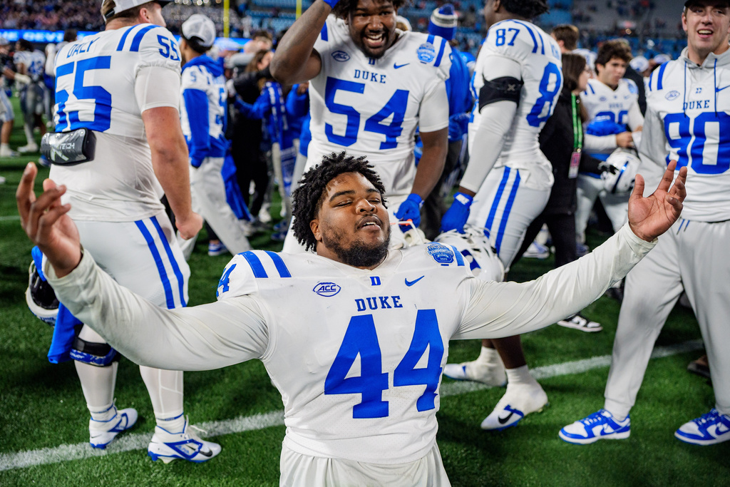 Duke defensive tackle David Anderson (44) reacts after defeating Virginia in the Atlantic Coast Conference championship NCAA college football game Saturday, Dec. 6, 2025, in Charlotte, N.C. (AP Photo/Jacob Kupferman)