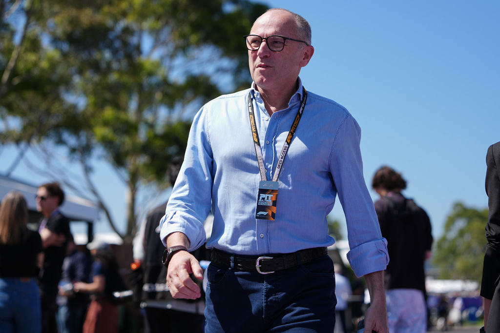 Stefano Domenicali walks down the F1 Paddock ahead of the Australian Formula One Grand Prix at Albert Park, in Melbourne, Australia, Thursday, March 5, 2026. (AP Photo/Asanka Brendon Ratnayake)