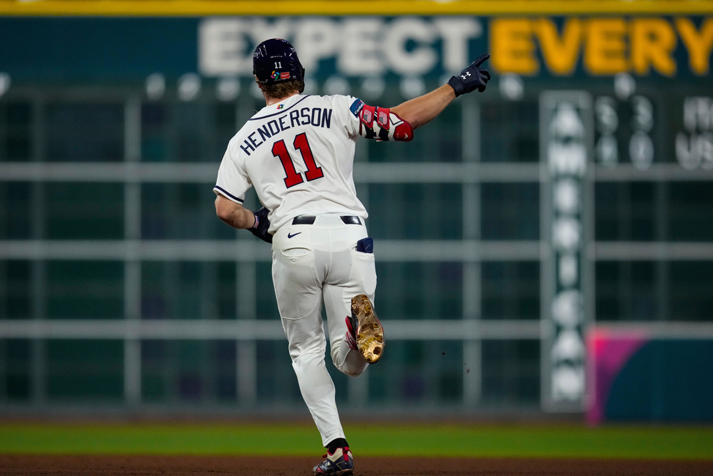 United States shortstop Gunnar Henderson (11) celebrates after hitting a home run in the sixth inning of a World Baseball Classic game, Tuesday, March 10, 2026, in Houston. (AP Photo/Ashley Landis)