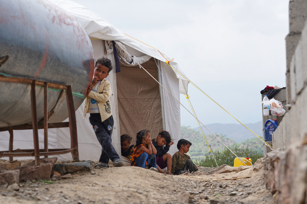 Displaced Yemeni children from Al-Kadha, west of Taiz, gather at the Al-Akdaf camp in Taiz, Yemen, Saturday, Sept. 26, 2026. (AP Photo/Abdulnasser Alseddik)