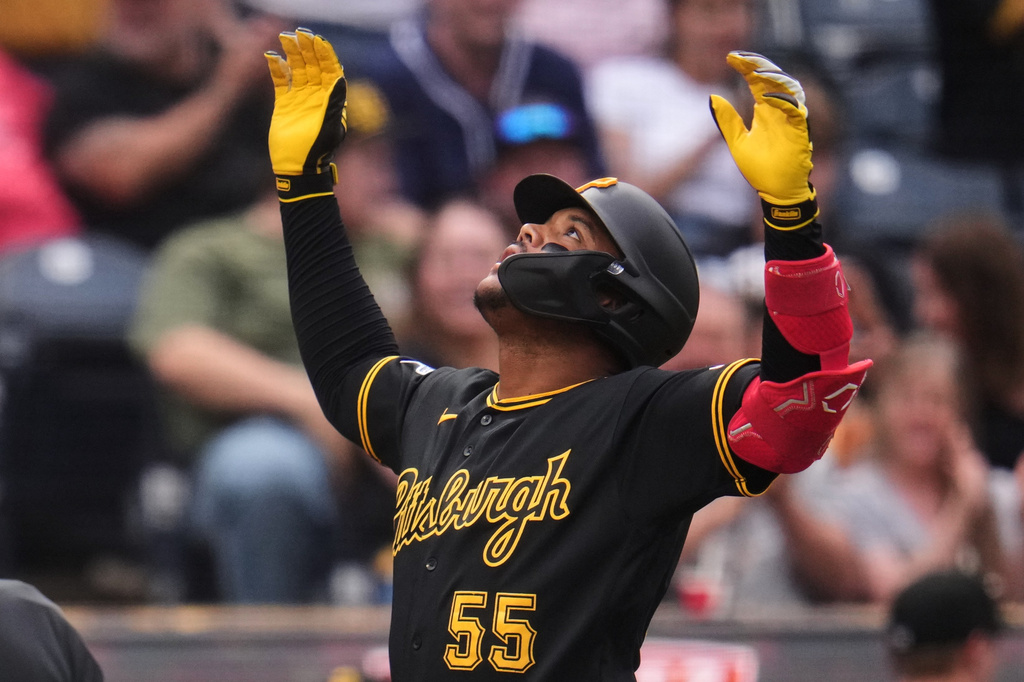 Pittsburgh Pirates' Esmerlyn Valdez celebrates as he crosses home plate after hitting a two-run home run off Chicago Cubs pitcher Jordan Wicks during the first inning of a baseball game in Pittsburgh, Tuesday, May 26, 2026. (AP Photo/Gene J. Puskar)