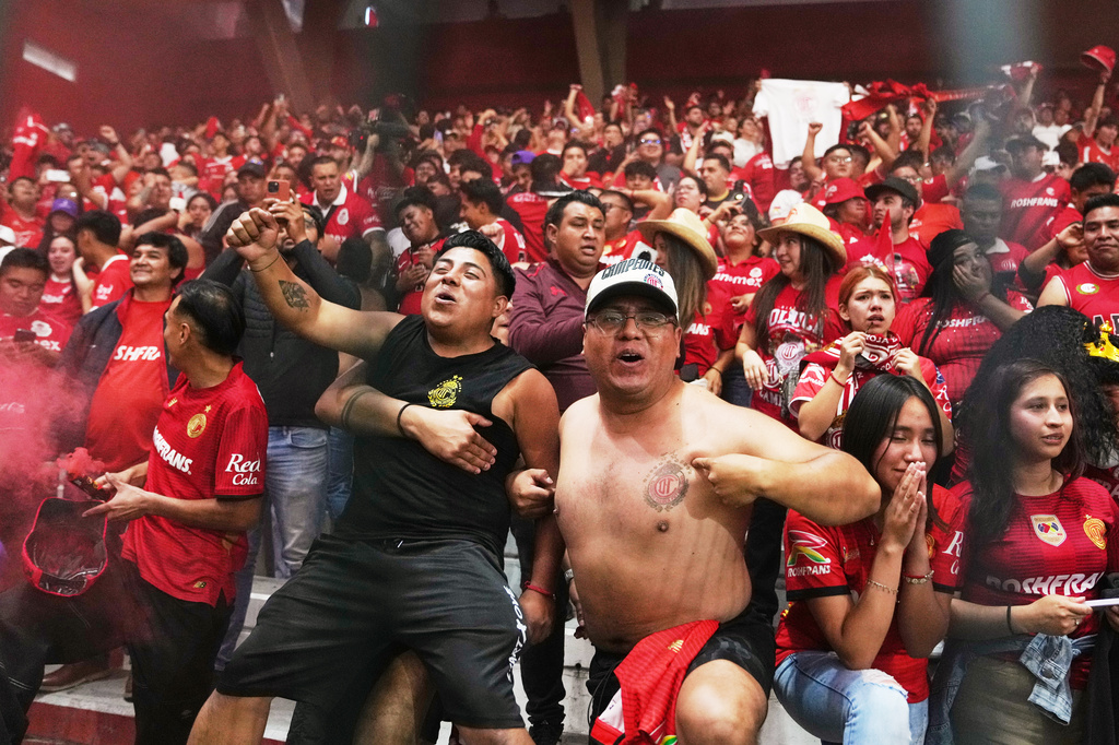 Toluca fans reacts during the penalty shootout on the CONCACAF Champions Cup final soccer match against Tigres in Toluca, Mexico, Saturday, May 30, 2026. (AP Photo/Fernando Llano)