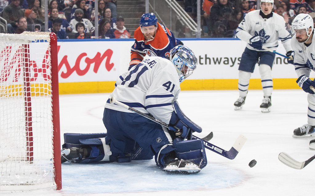 Toronto Maple Leafs' goalie Anthony Stolarz (41) makes a save on Edmonton Oilers' Leon Draisaitl (29) during the second period of an NHL game in Edmonton, Tuesday, Feb. 3, 2026. (Jason Franson/The Canadian Press via AP)