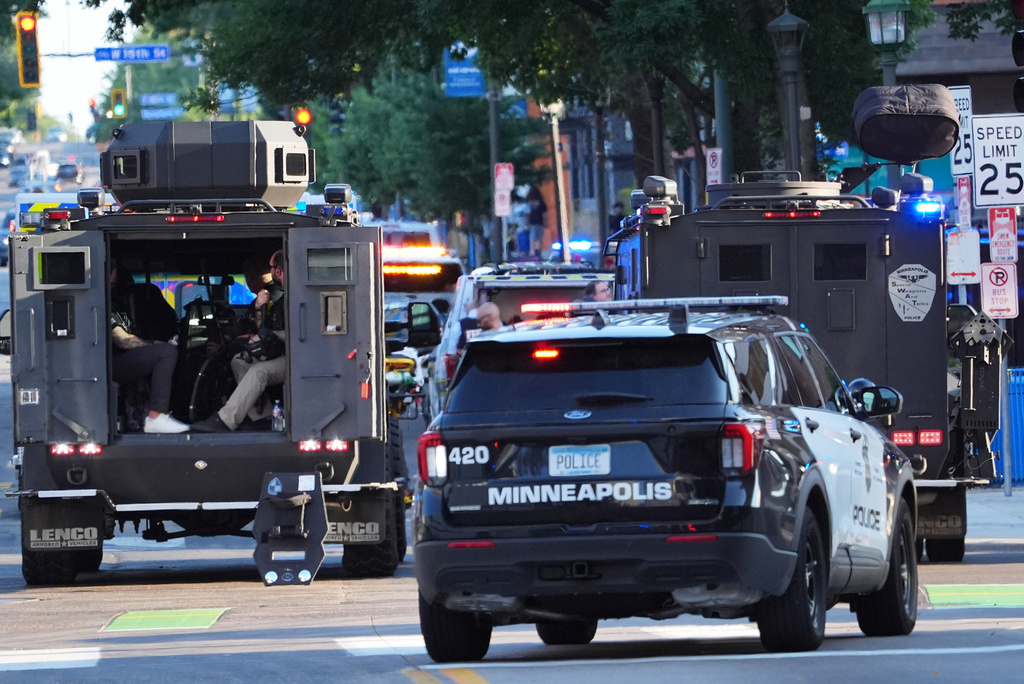 Law enforcement respond to a shooting Wednesday, Sept. 2, 2026, in downtown Minneapolis. (AP Photo/Ellen Schmidt)