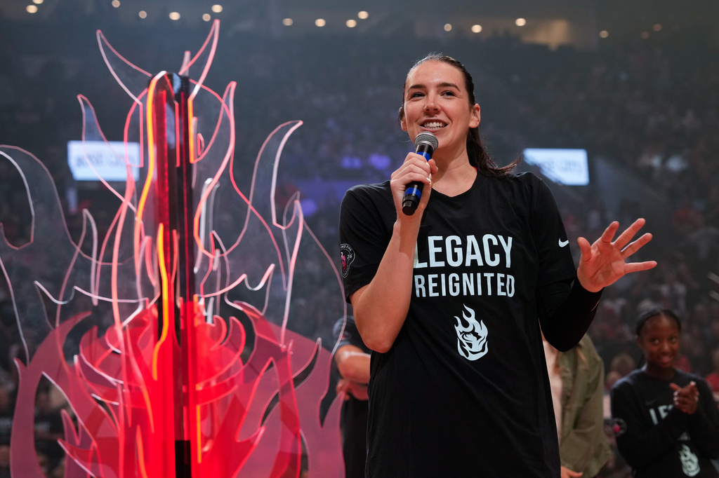 FILE - Portland Fire forward Bridget Carleton speaks before a WNBA basketball game against the Chicago Sky, May 9, 2026, in Portland, Ore. (AP Photo/Jenny Kane, File)