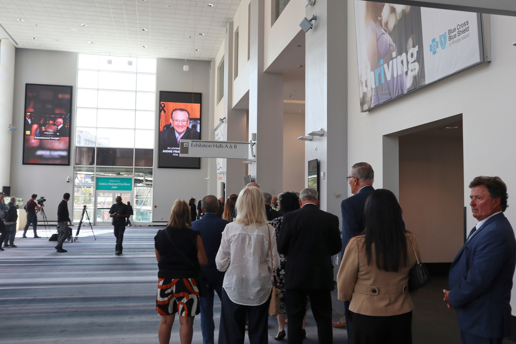 Mourners wait in line to pay their respects to former Judge Frank Caprio at the Rhode Island Convention Center in Providence, R.I. on Thursday, Aug. 28, 2025. (AP Photo/Leah Willingham)