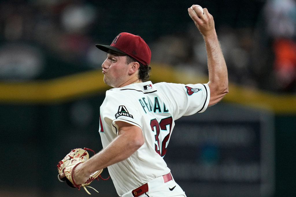 Arizona Diamondbacks starting pitcher Brandon Pfaadt throws against the San Diego Padres during the first inning of a baseball game, Monday, Aug. 3, 2026, in Phoenix. (AP Photo/Ross D. Franklin)