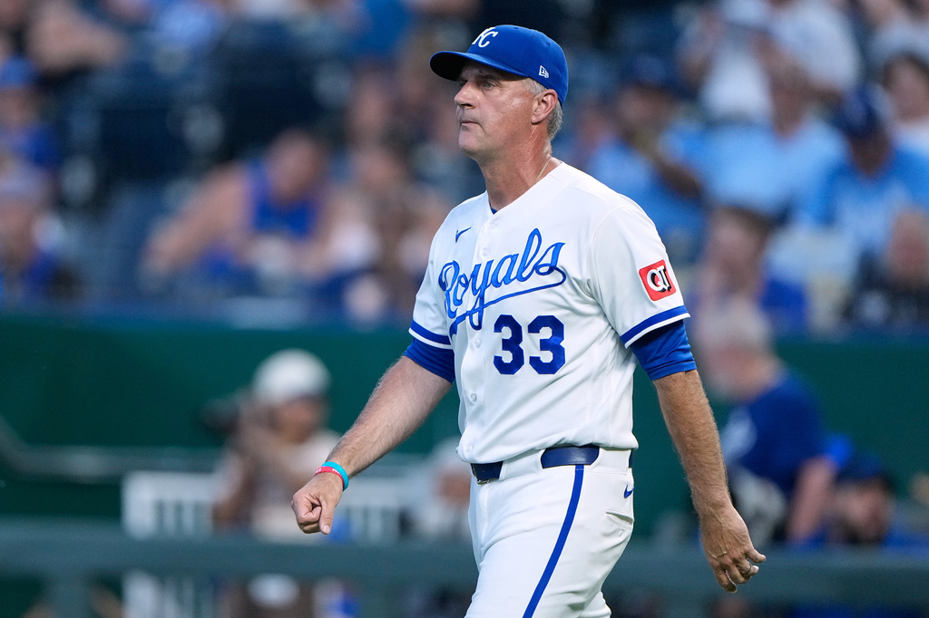 Kansas City Royals manager Matt Quatraro walks to the mound to make a pitching change during the sixth inning of a baseball game against the Tampa Bay Rays, Tuesday, June 30, 2026, in Kansas City, Mo. (AP Photo/Charlie Riedel)
