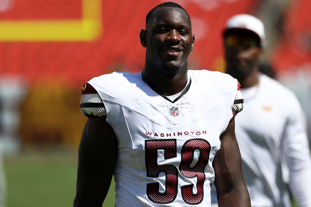 FILE - Washington Commanders linebacker T.J. Maguranyanga (59) looks on after an NFL football game against the Baltimore Ravens, Saturday, Aug. 23, 2025, in Landover. (AP Photo/Daniel Kucin Jr., File)