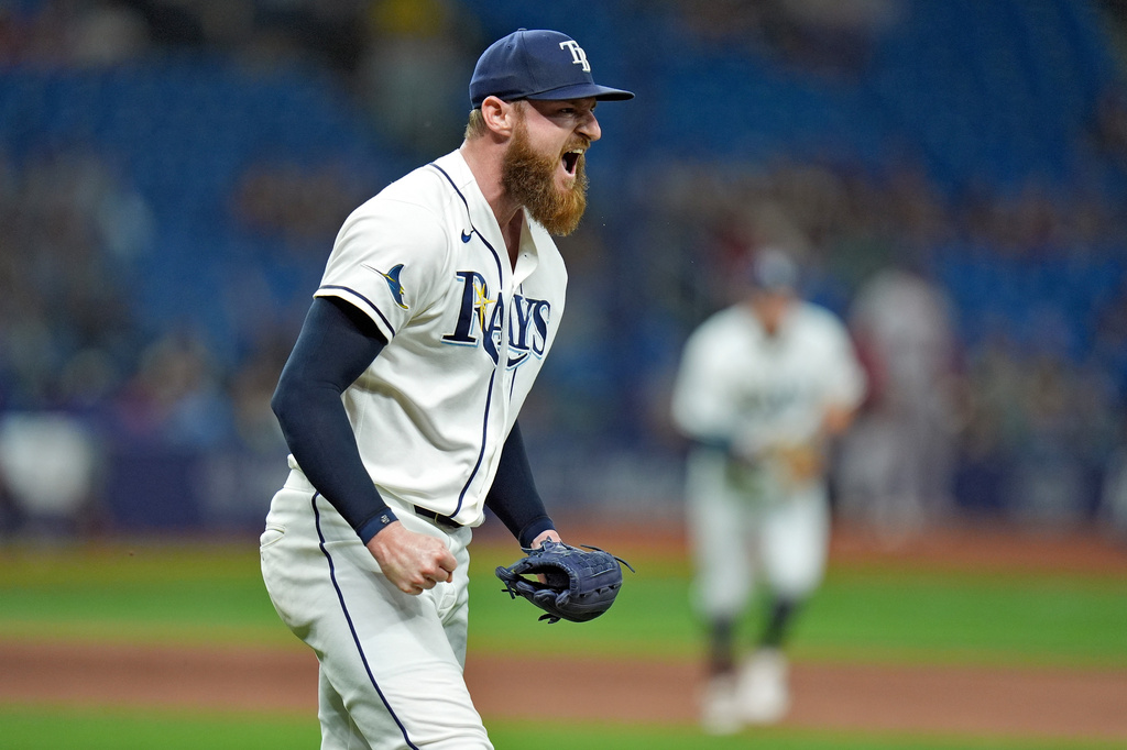 Tampa Bay Rays pitcher Bryan Baker reacts after closing out the Boston Red Sox during the ninth inning of a baseball game Monday, June 8, 2026, in St. Petersburg, Fla. (AP Photo/Chris O'Meara)