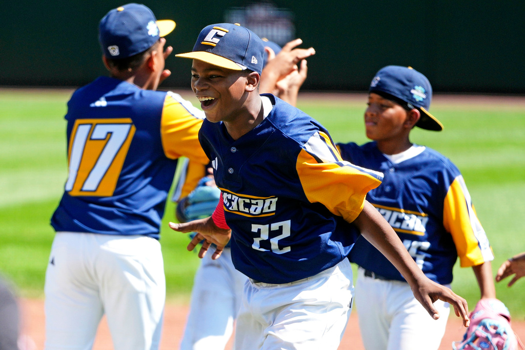 Curacao's V-dien Ignacio Lindo (22) celebrates after the final out in the International Championship baseball game against Japan at the Little League World Series tournament in South Williamsport, Pa., Saturday, Aug. 29, 2026. (AP Photo/Gene J. Puskar)