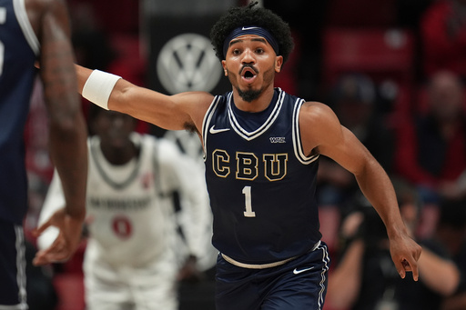 FILE - California Baptist guard Dominique Daniels Jr. gestures during the first half of an NCAA college basketball game against San Diego State, Wednesday, Dec. 11, 2024, in San Diego. (AP Photo/Gregory Bull, File) FILE - California Baptist guard Dominique Daniels Jr. gestures during the first half of an NCAA college basketball game against San Diego State, Wednesday, Dec. 11, 2024, in San Diego. (AP Photo/Gregory Bull, File)