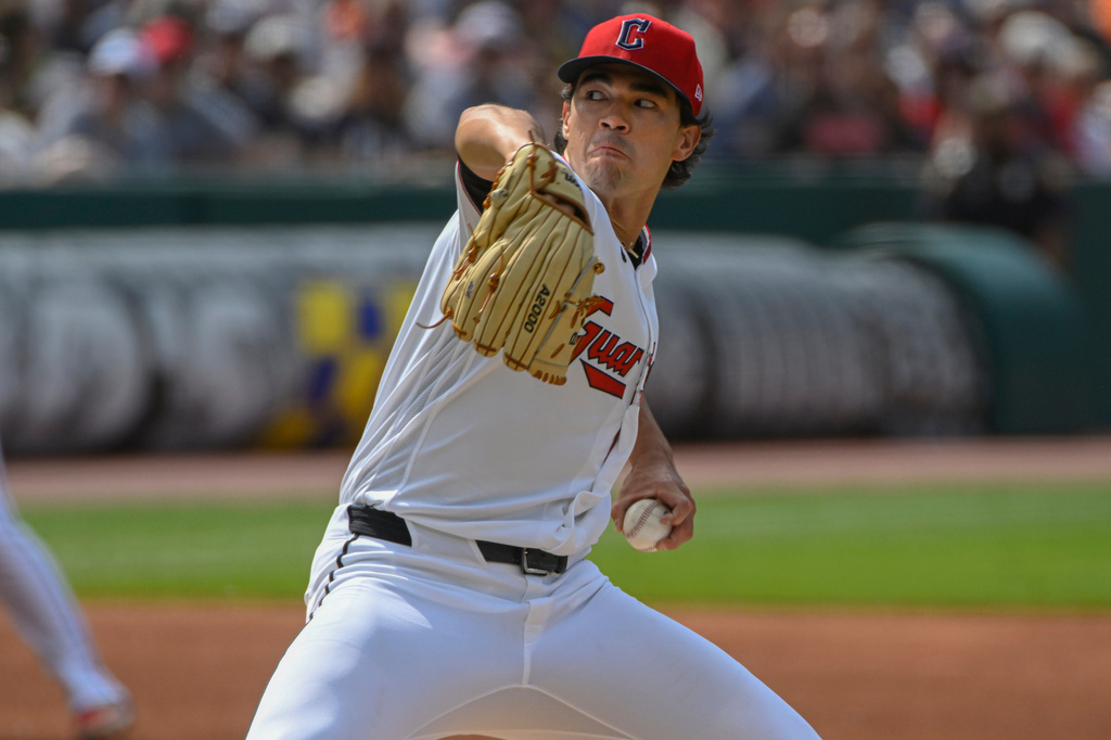 Cleveland Guardians starting pitcher Joey Cantillo delivers against the Detroit Tigers during the first inning of a baseball game, Saturday, June 13, 2026, in Cleveland. (AP Photo/Phil Long)