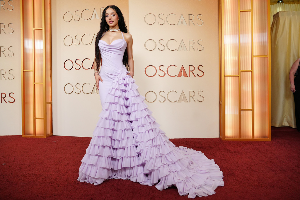 Chase Infiniti arrives at the Oscars on Sunday, March 15, 2026, at the Dolby Theatre in Los Angeles. (Photo by Jordan Strauss/Invision/AP)