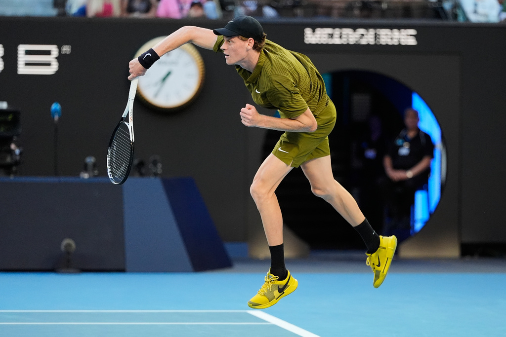 Jannik Sinner of Italy serves to Hugo Gaston of France during their first round match at the Australian Open tennis championship in Melbourne, Australia, Tuesday, Jan. 20, 2026. (AP Photo/Asanka Brendon Ratnayake)