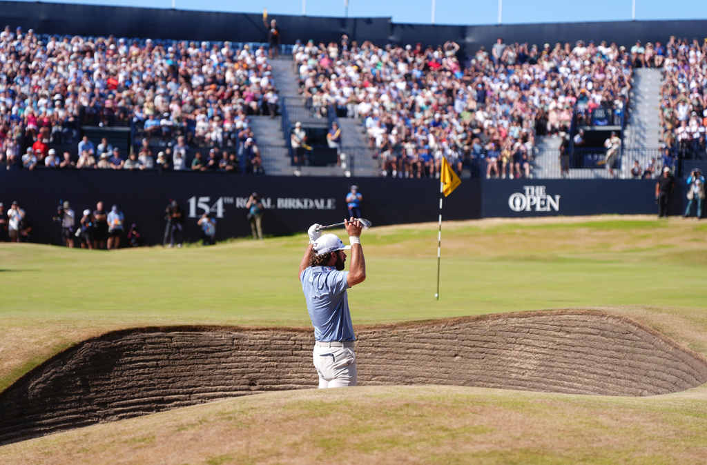 Cameron Young of the United States reacts to nearly chipping in during the British Open Golf championships at Royal Birkdale golf club, in Southport, England, Sunday, July 19, 2026. (David Davies/PA via AP)