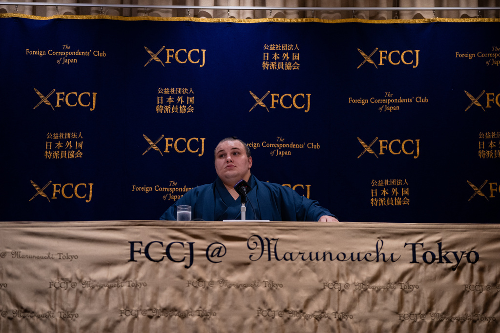 Ukrainian sumo wrestler Danilo Yavhushyshyn, known by his Japanese name Aonishiki Arata, reacts during a press conference at the Foreign Correspondents' Club of Japan, in Tokyo, Thursday, Oct. 9, 2025. (AP Photo/Louise Delmotte)