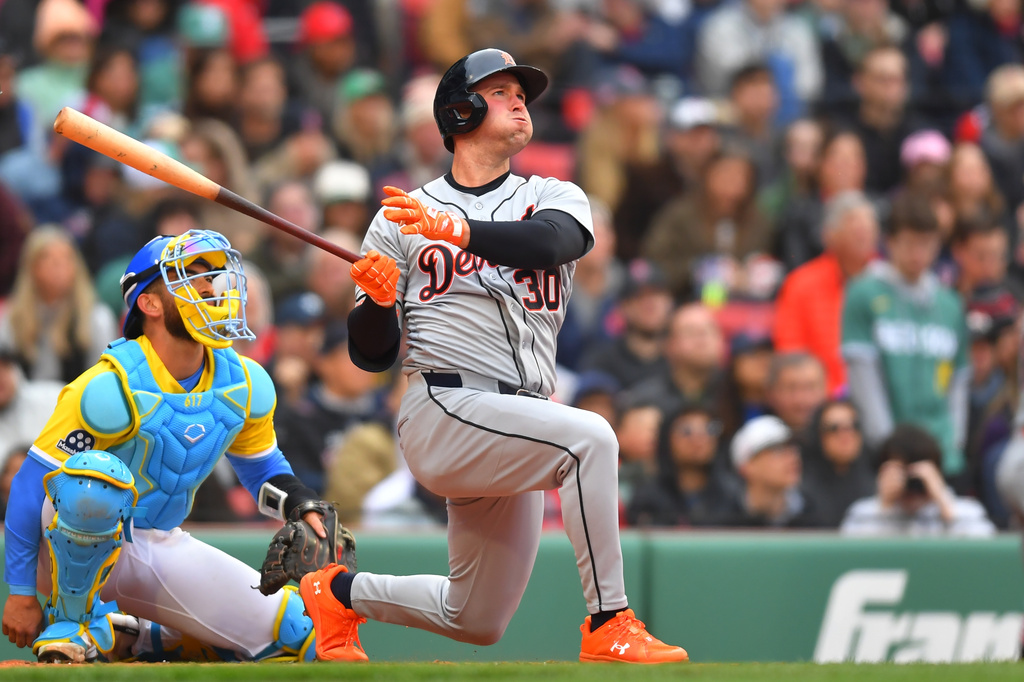 Detroit Tigers' Kerry Carpenter (30) watches his home run in front of Boston Red Sox catcher Connor Wong, left, in the fourth inning of a baseball game, Saturday, April 18, 2026, in Boston. (AP Photo/Steven Senne)