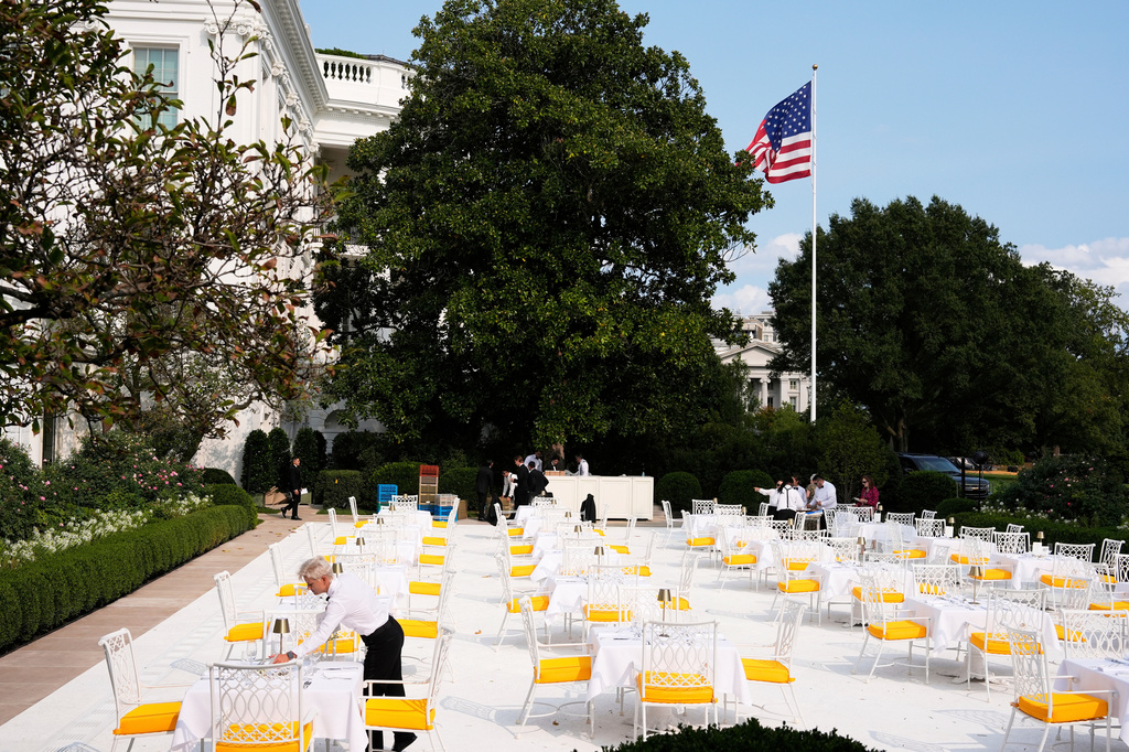FILE - Workers prepare the Rose Garden for a dinner that will be hosted by President Donald Trump, Sept. 5, 2025, in Washington. (AP Photo/Alex Brandon, File)