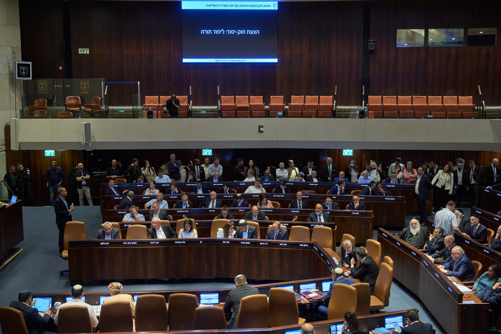 Israeli lawmakers attend a parliamental hearing for a bill that wants to equate study of Jewish texts with military service, in Jerusalem, Monday, July 13, 2026. (AP Photo/Ohad Zwigenberg)