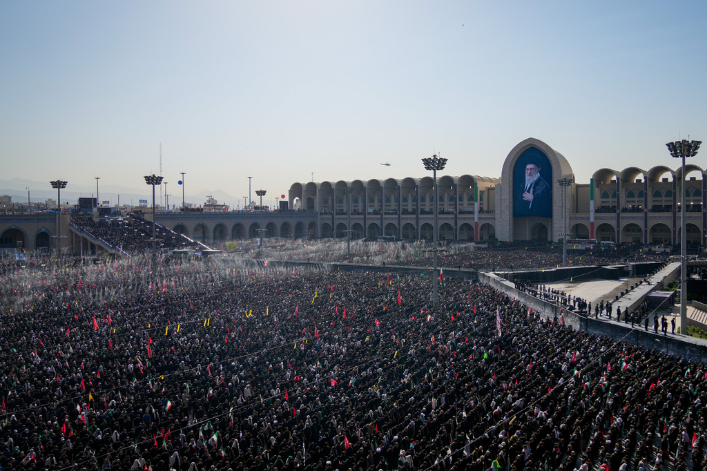 Mourners pray during funeral prayers held as part of the dayslong funeral ceremonies for the slain Iranian Supreme Leader Ayatollah Ali Khamenei and members of his family at the Imam Khomeini Mosalla Grand Mosque in Tehran, Iran, Sunday, July 5, 2026. (AP Photo/Altaf Qadri)