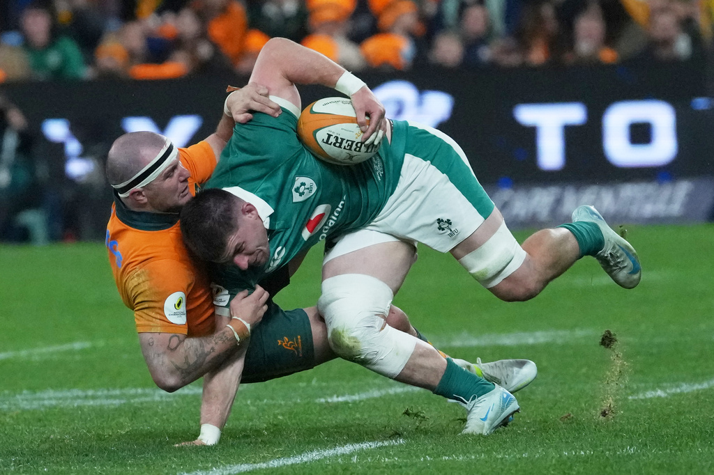 Australia's Dylan Pietsch, brings down Ireland's Nick Timoney during the Nations Championship rugby international between Australia and Ireland in Sydney, Saturday July, 4, 2026. (AP Photo/Mark Baker)