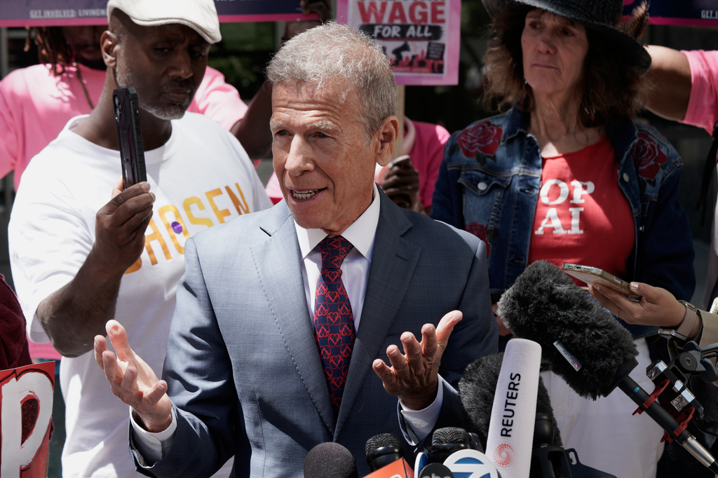 Marc Toberoff, attorney for Elon Musk, speaks to reporters outside the U.S. District Court, Monday, May 18, 2026, in Oakland, Calif. (AP Photo/Nathan Weyland)