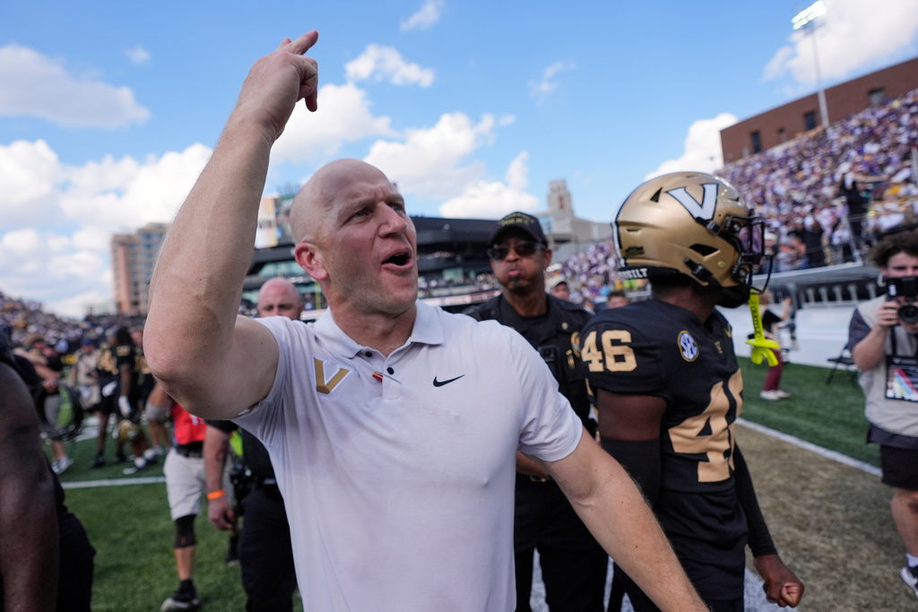 Vanderbilt head coach Clark Lea celebrates the team's win after an NCAA college football game against LSU, Saturday, Oct. 18, 2025, in Nashville, Tenn. (AP Photo/George Walker IV)