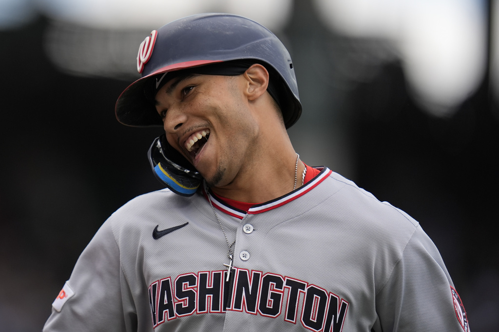 Washington Nationals' Daylen Lile (51) celebrates after hitting a home run during the fourth inning of a baseball game against the Chicago Cubs, Saturday, Sept. 6, 2025, in Chicago. (AP Photo/Erin Hooley)