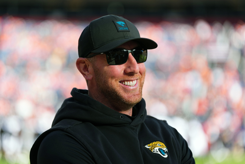 Jacksonville Jaguars head coach Liam Coen looks on before an NFL football game against the Denver Broncos in Denver, Sunday, Dec. 21, 2025. (AP Photo/Jack Dempsey)