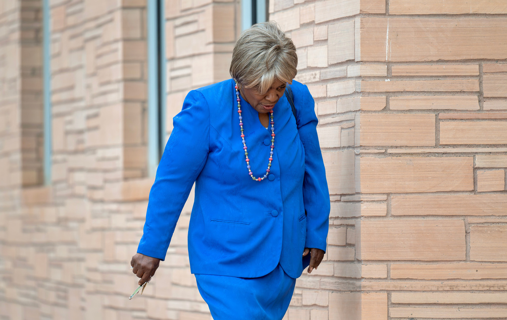 Former New Mexico House Majority Leader Sheryl Williams Stapleton walks into the federal courthouse in Albuquerque, N.M., on Friday, Aug. 14, 2026. (Eddie Moore/The Albuquerque Journal via AP)