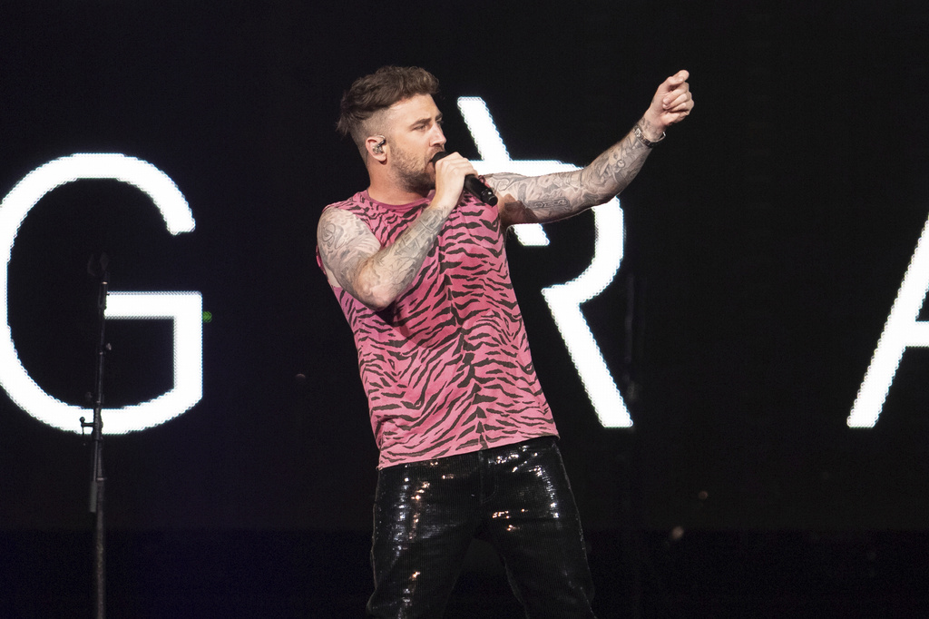 FILE - Singer Jordan McGraw performs on stage as an opening act for The Jonas Brothers "Happiness Begins" tour at the Capitol One Arena, Aug. 15, 2019, in Washington. (Photo by Brent N. Clarke/Invision/AP, File)