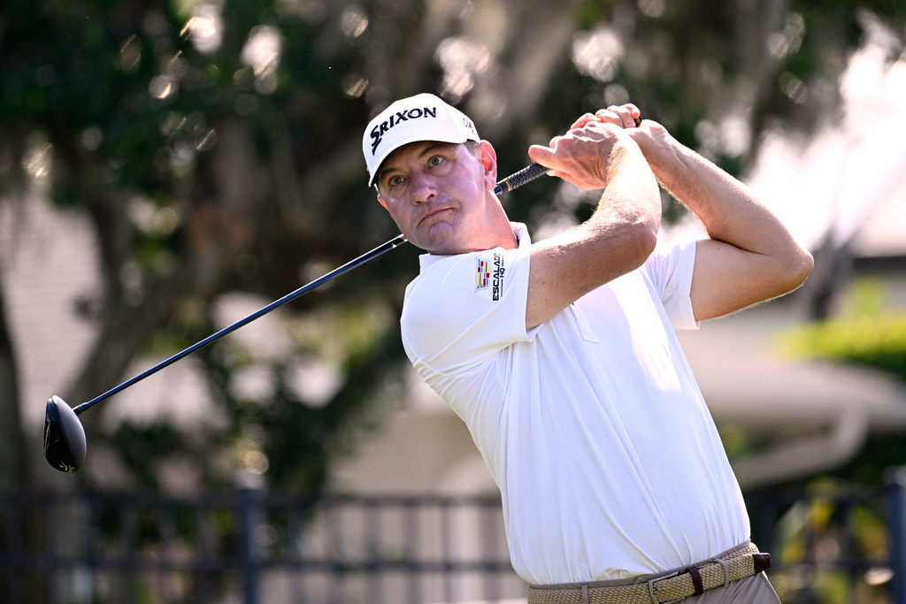 FILE - Lucas Glover tees off on the fourth hole during the final round of the Arnold Palmer Invitational at Bay Hill golf tournament, March 9, 2025, in Orlando, Fla. (AP Photo/Phelan M. Ebenhack, File)