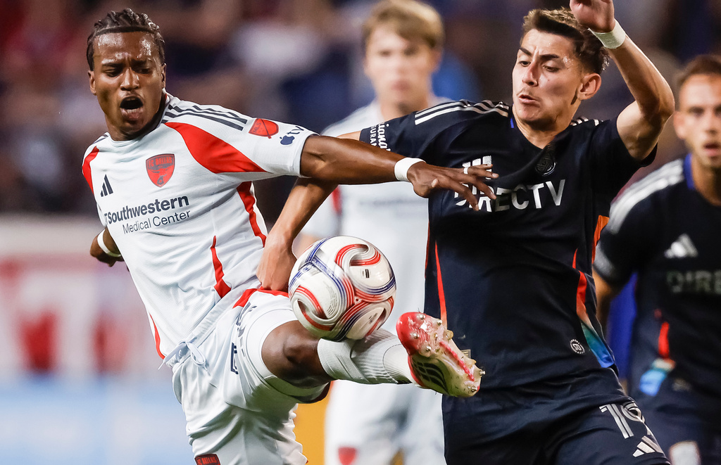 FC Dallas' Kaick, left, battles San Diego FC's David Vazquez (19) during an MLS soccer match, Saturday, March 14, 2026, in Frisco, Texas. (AP Photo/Brandon Wade)