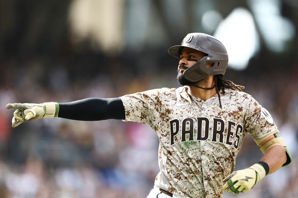 San Diego Padres' Fernando Tatis Jr. celebrates after hitting a home run in the seventh inning of a baseball game against the Miami Marlins, Sunday, Sept. 20, 2026, in San Diego. (AP Photo/Karl Anderson)
