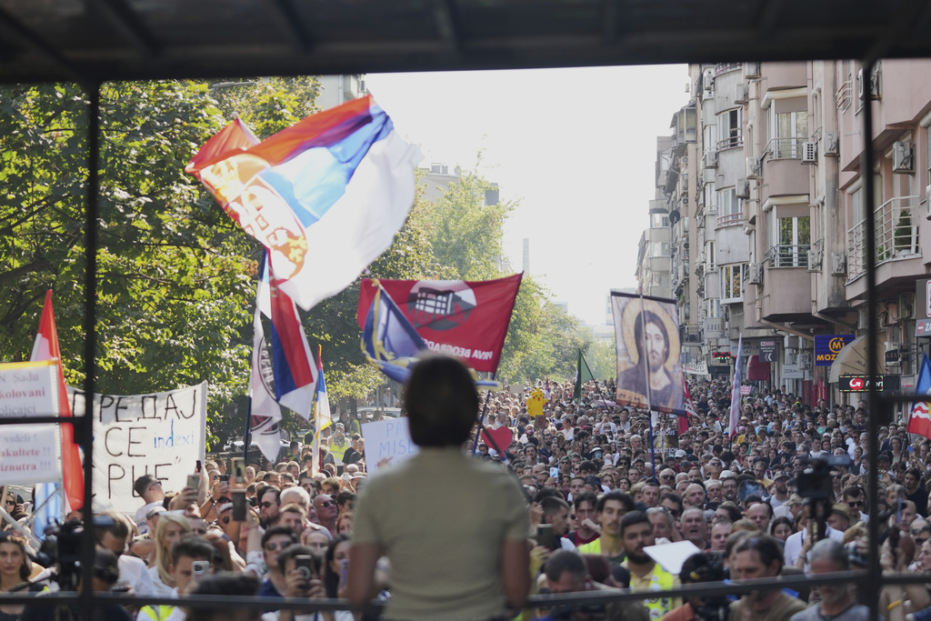 Led by university students, people attend a protest against increasing police brutality in Belgrade, Serbia, Monday, Sept. 8, 2025. (AP Photo/Darko Vojinovic)