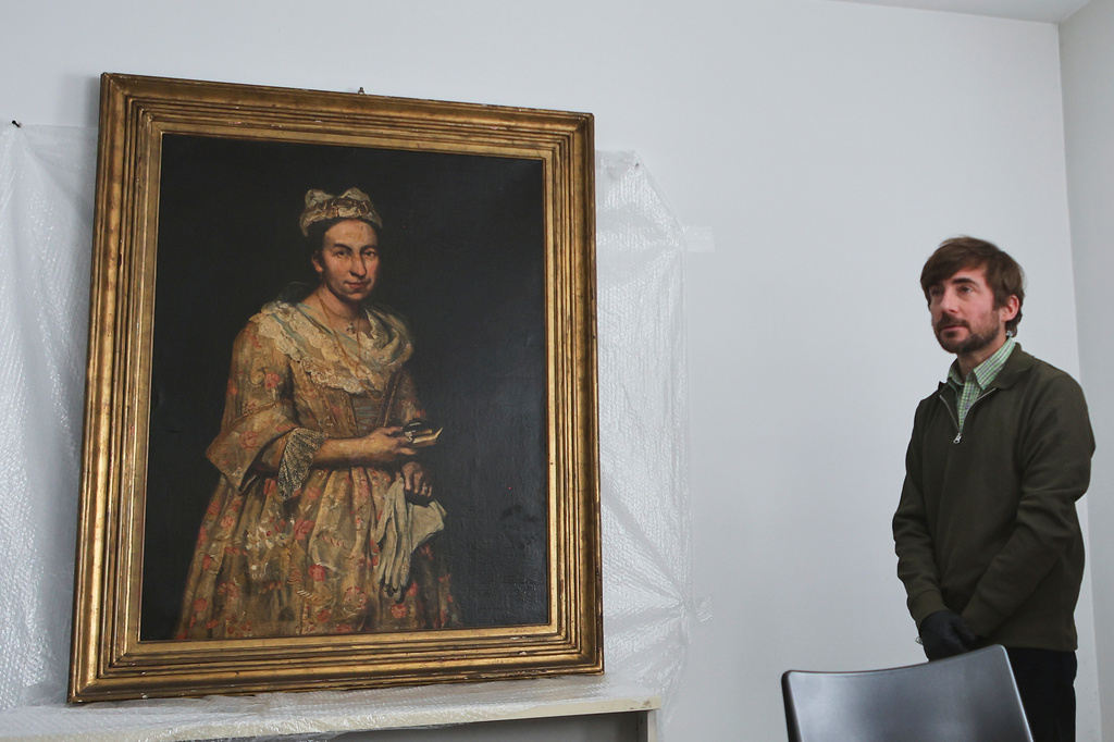 FILE - The 18th-century painting "Portrait of a Lady," allegedly stolen by a Nazi officer during World War II, is displayed during a news conference in Mar del Plata, Argentina, on Sept. 3, 2025. (AP Photo/Christian Heit, File)