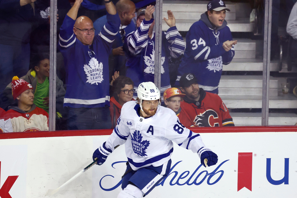 Toronto Maple Leafs' William Nylander (88) celebrates after his goal against the Calgary Flames during first-period NHL hockey game action in Calgary, Alberta, Monday, Feb. 2, 2026. (Larry MacDougal/The Canadian Press via AP)