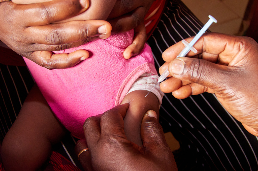 A baby receives a malaria vaccine at the Soa District Hospital in Yaounde, Cameroon, Wednesday, April 29, 2026. (AP Photo/Angel Ngwe)