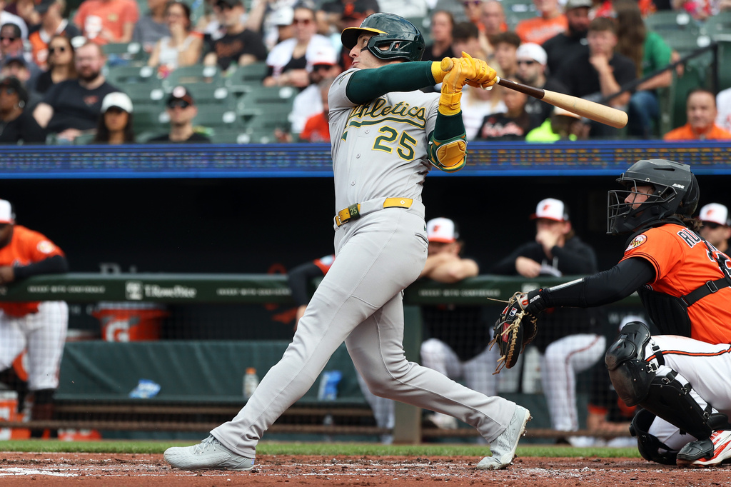 Athletics' Brent Rooker hits a home run during the third inning of a baseball game against the Baltimore Orioles, Saturday, May 9, 2026, in Baltimore. (AP Photo/Daniel Kucin Jr.)