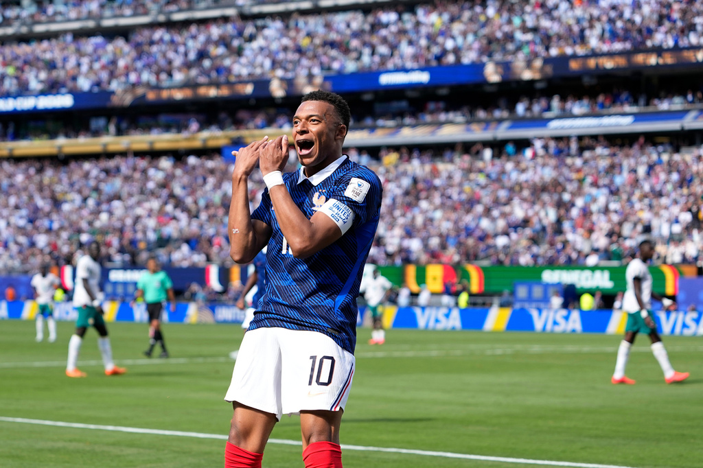 France's Kylian Mbappe celebrates after scoring the opening goal of his team during the World Cup Group I soccer match between France and Senegal in East Rutherford, N.J., near New York, Tuesday, June 16, 2026. (AP Photo/Frank Franklin II)