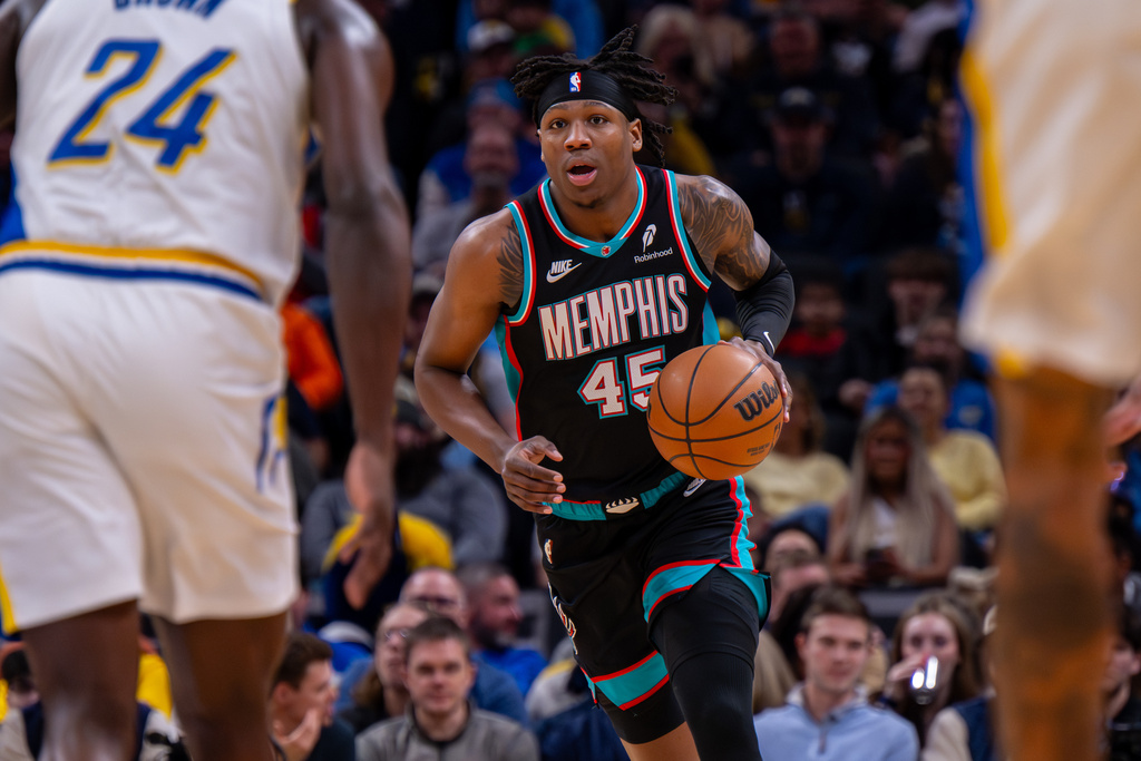 Memphis Grizzlies forward GG Jackson (45) brings the ball upcourt during the first half of an NBA basketball game against the Indiana Pacers in Indianapolis, Sunday, March 1, 2026. (AP Photo/Doug McSchooler)